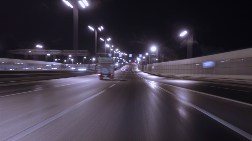 Driving Car On Street City At Dark. Time Lapse. Evening Street Lights. Camera In Front, Windshield Reference. Hyperlapse. Driving Car POV On Road Urban In Of Night In With Bright Lights Traffic. | Shutterstock HD Video #1041454045
