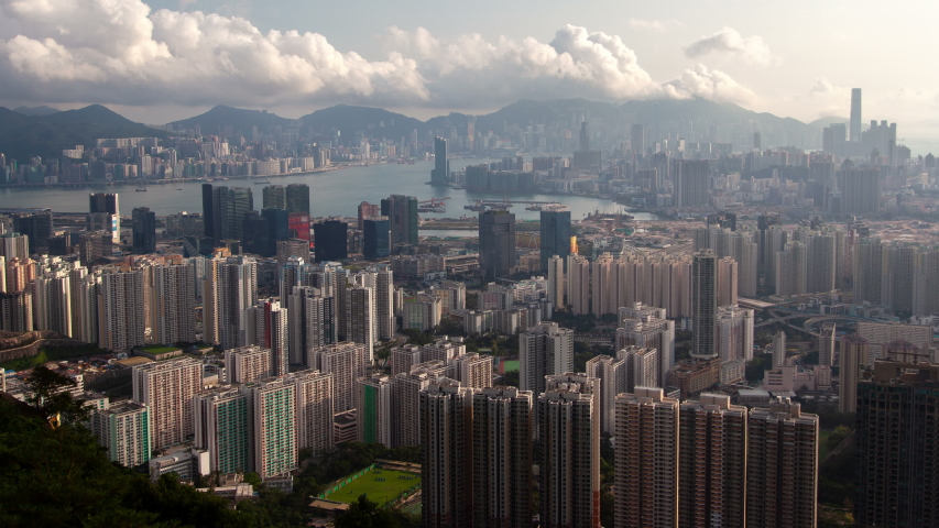Hong Kong urban cityscape aerial skyline panorama timelapse at day pan up