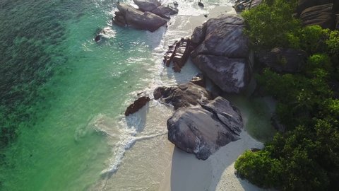 Seychelles waves hits on rockes in Paradise Mahe island Drone shot 4K