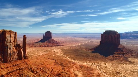 Aerial 4K view over the territory of Monument Valley Navajo Tribal Park. Amazingly beautiful landscape of the valley, familiar to everyone from the famous western movies, documentaries and commercials
