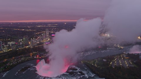Niagara Falls Ontario Aerial v11 Sunset cityscape view panning to Horseshoe Falls Park mist cloud detail - October 2017