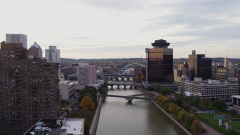Rochester New York Aerial v40 Low fly over river and downtown cityscape - October 2017
