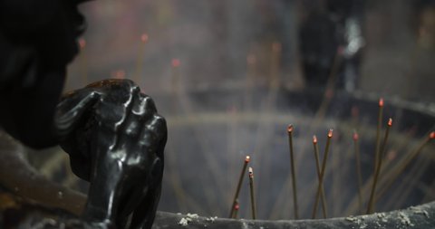Smoke in a traditional Taiwanese Incense Burner at the Longshan Temple in Taipei, Taiwan, Republic of China. East asian culture and religion. Happy Chinese new year of the ox!