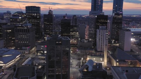 Aerial: Establishing shot of the Edmonton city skyline & traffic at night. Edmonton, Alberta, Canada. 21 April 2019 