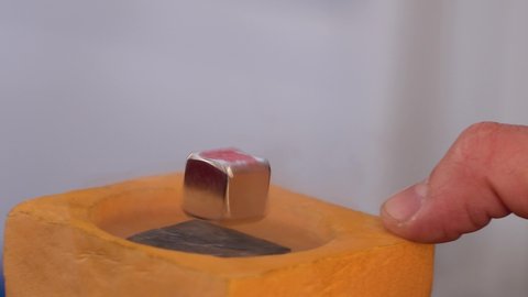 Superconductor and nitrogen - experience with liquid nitrogen cooling and magnet levitation. Quantum levitation. 4k footage.