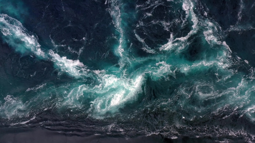Waves of water of the river and the sea meet each other during high tide and low tide. Whirlpools of the maelstrom of Saltstraumen, Nordland, Norway Royalty-Free Stock Footage #1041515752