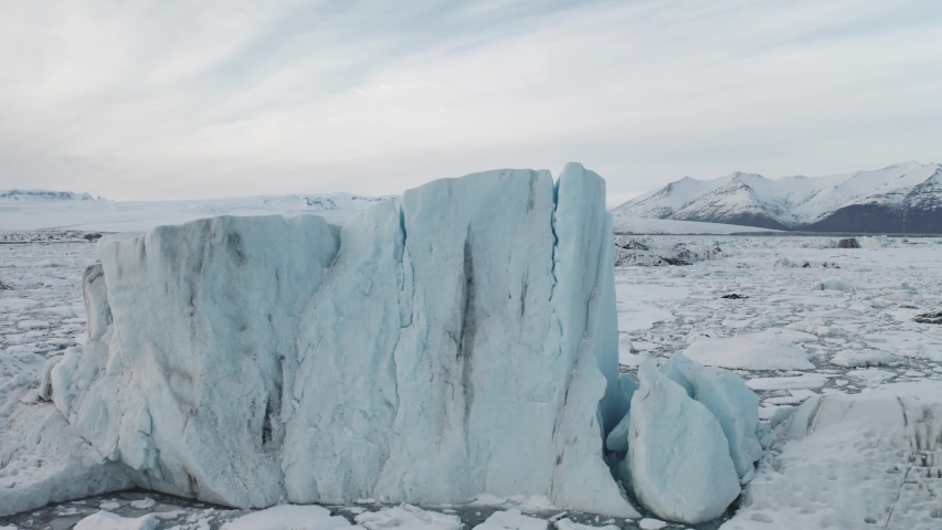 Aerial view of the J kuls rl n glacial lagoon and floating icebergs. The beginning of spring in Iceland