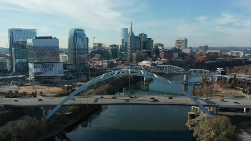 day flying over Korean War Vet Bridge towards Nashville skyline