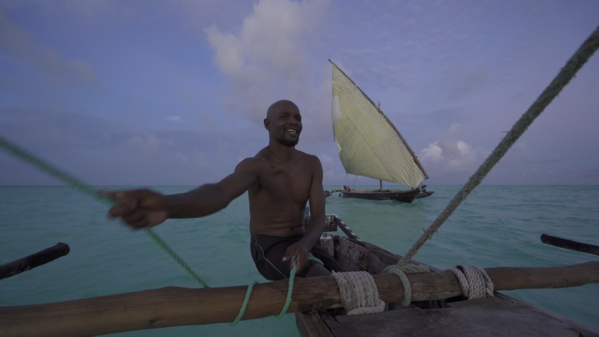 Dhow outrigger sailing boat. Zanzibar coast. Tanzania.