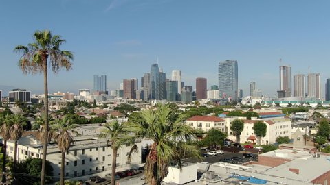 Los Angeles, California, USA - Sep 25 2019: Los Angeles Downtown Aerial Establish Shot Pico Union Palm Trees Forward