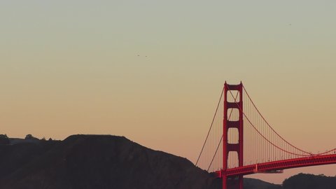 The Golden Gate Bridge as seen at sunset from Baker Beach, San Francisco, California, USA, 2018