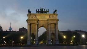 Ancient triumphal arch (Porta Sempione), evening. Milan, Italy