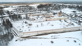 The old Tikhvin Assumption monastery, March day (aerial video). Tikhvin, Russia 