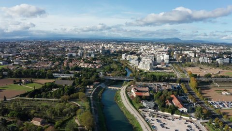 Montpellier Lez river aerial view Port Marianne neighbourhood modern bridge and highway sunny day 