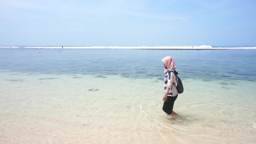 Someone walking on the beach
