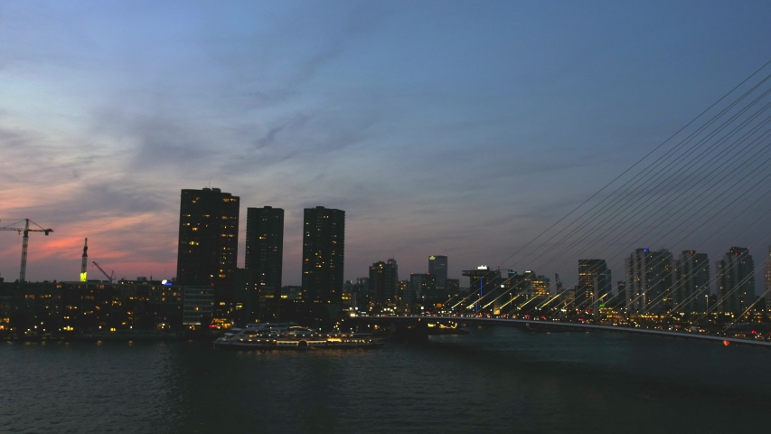 Panoramic view of Erasmus Bridge from Cruise Terminal Rotterdam at night. Rotterdam, Netherlands