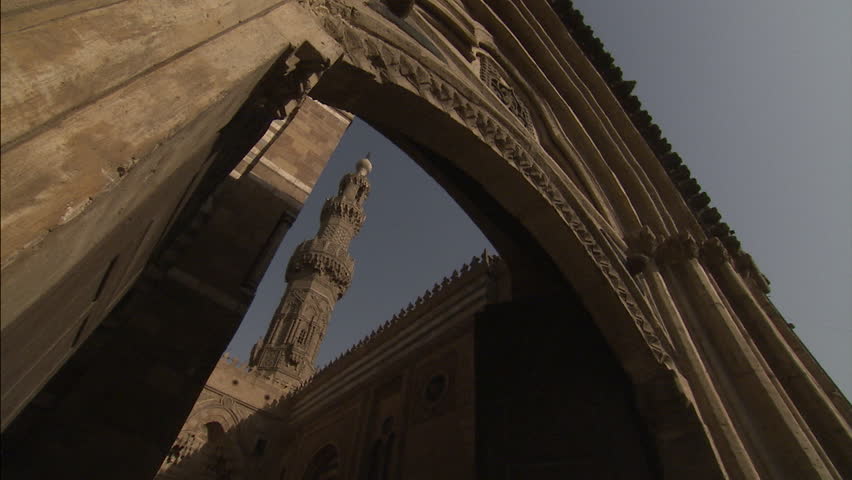 View of al-Azhar mosque minaret through arch, Cairo
