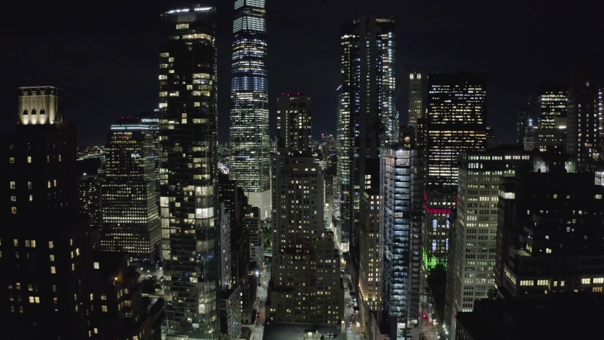 Aerial flying over manhattan night street. Royalty-Free Stock Footage #1041603247