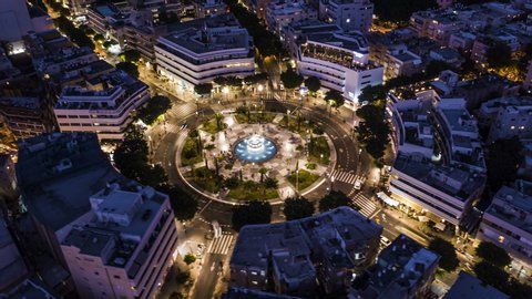 Big roundabout - Aerial hyperlapse - Dizengoff square in tel Aviv, Israel, at night, 4k drone view