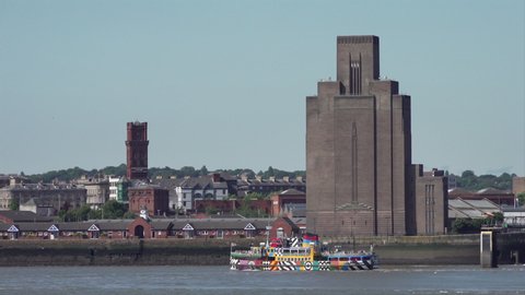 LIVERPOOL, MERSEYSIDE/ENGLAND - JULY 23, 2019: Liverpool Mersey ferry and Wirral Mersey Tunnel ventilation shaft, England