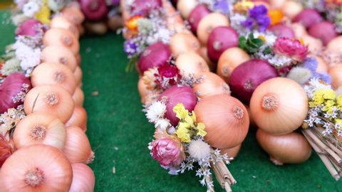 BERNE , SWITZERLAND - NOVEMBER 25, 2019: close up of onions at the traditional Swiss Festival in Berne, called "Zibelemaerit" (market of onions), Fair of Onions 