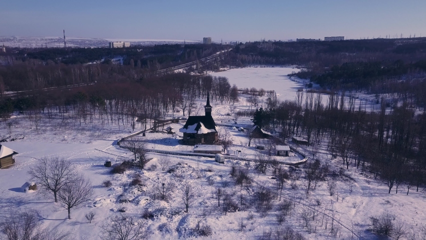top view of a old wooden church in Kishinev, republic of Moldova. Winter landscape whit wooden church