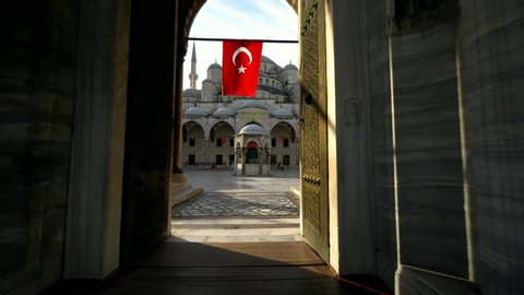 Blue mosque or Sultanahmet courtyard interior view turkish architecture muslim islam temple cultural heritage. Famous travel sight place of interest. Istanbul Turkey Fatih. Gimbal move tilt shot