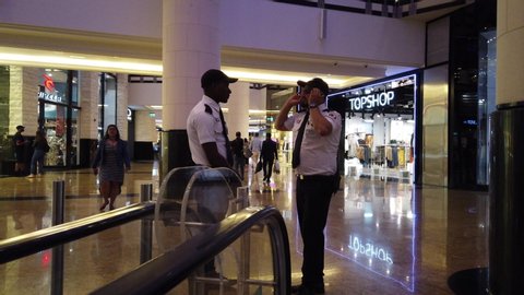 Dubai , Al Garhoud / United Arab Emirates - 02 06 2019: Dubai Marina / UAE – February 06 2019: Security guards in the Mall of the Emirates shopping centre, Dubai.