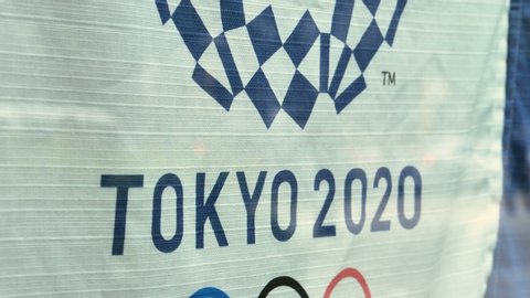 Tokyo Japan 2019 November 04: The Tokyo 2020 Olympic flaglets hanging outside the Olympic Museum building in Tokyo