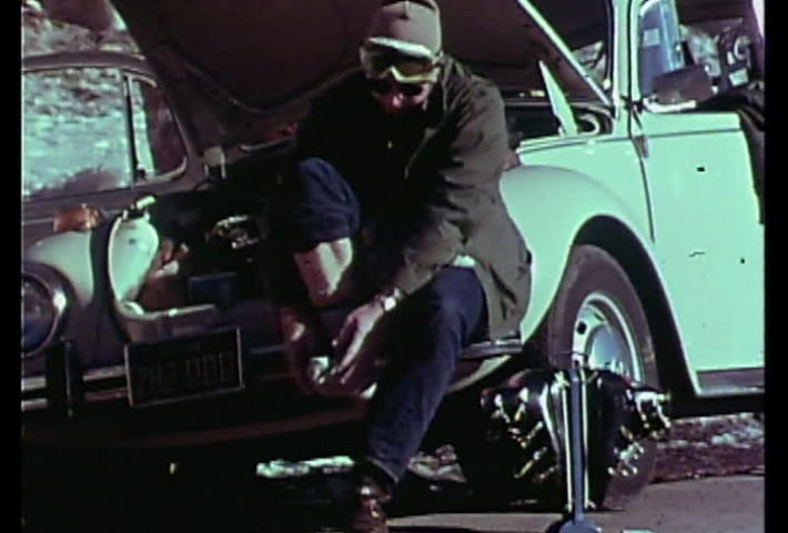 Salt Lake City, Utah, circa 1970s.  Vintage footage from a tourism film of people getting ready to go skiing.
