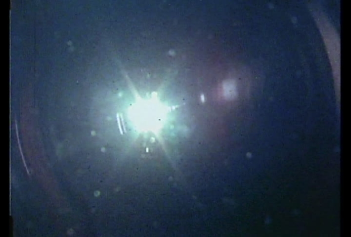 Salt Lake City, Utah, circa 1974.  Vintage footage from a tourism film of hip, hot-dog expert skiers jumping, and skiing fast at Utah ski resorts. 
