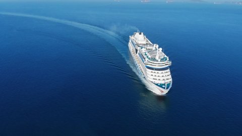 Aerial view of beautiful white cruise ship above luxury cruise in the ocean sea  concept tourism travel on holiday take a vacation time on summer.