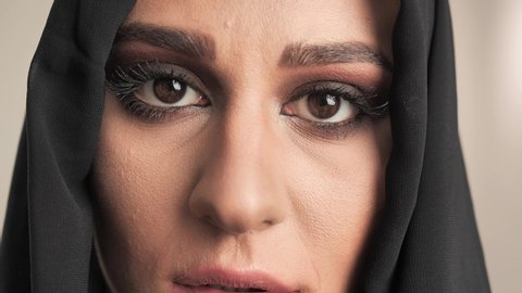 Close up portrait Eyes of arab woman in a burqa 4k