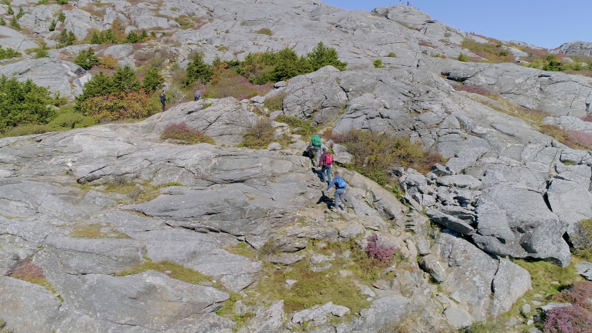 Drone footage of hikers on Mount Monadnock during fall