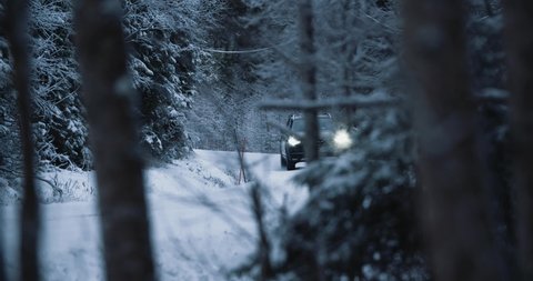 Bodo / Norway - 12 08 2017: Volvo XC90 driving on snow roads in a forest somewhere in Norway
