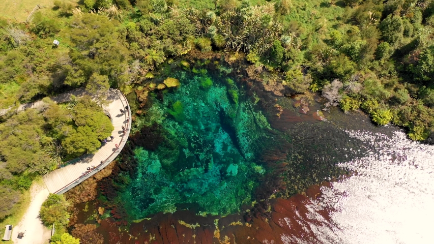 Aerial view of people visiting Mirror Lakes, observation deck, New Zealand.