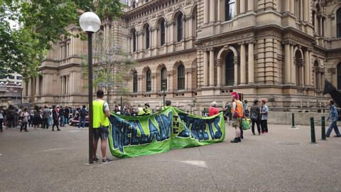 Sydney NSW Australia - Nov 23 2019: people gathered at Town Hall Square for a rally. Protesters demand pill testing and end to strip searches - Reclaim the Streets demand scrapping sniffer dogs