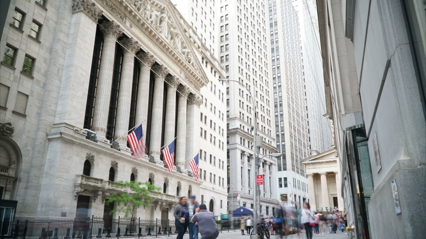 New York City, USA - Circa May 2019: New York Stock Exchange and the Wall Street Financial District visitors in a 4k Timelapse