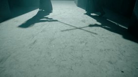 Shadow in floor of Japanese kendo fighters with bamboo swords competing in dark mystic industrial building. Epic battle video with two kendo fighter . Shot on ARRI Alexa Cinema Camera in slow motion .