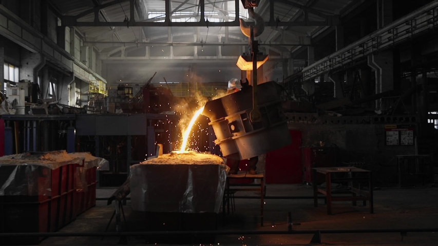 Hard work in the foundry. Pouring molten steel. Liquid steel pouring. Molten metal pouring, metallurgy, steel casting foundry. Steel manufacturing Royalty-Free Stock Footage #1041699523