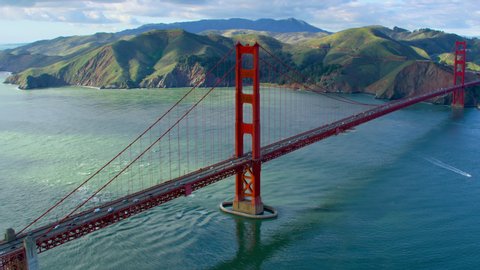Aerial view of the Golden Gate Bridge. San Francisco, US. With the hilly Marin Headlands in the background. This suspension bridge is one of the most iconic landmarks of California. Shot on RED 8K.