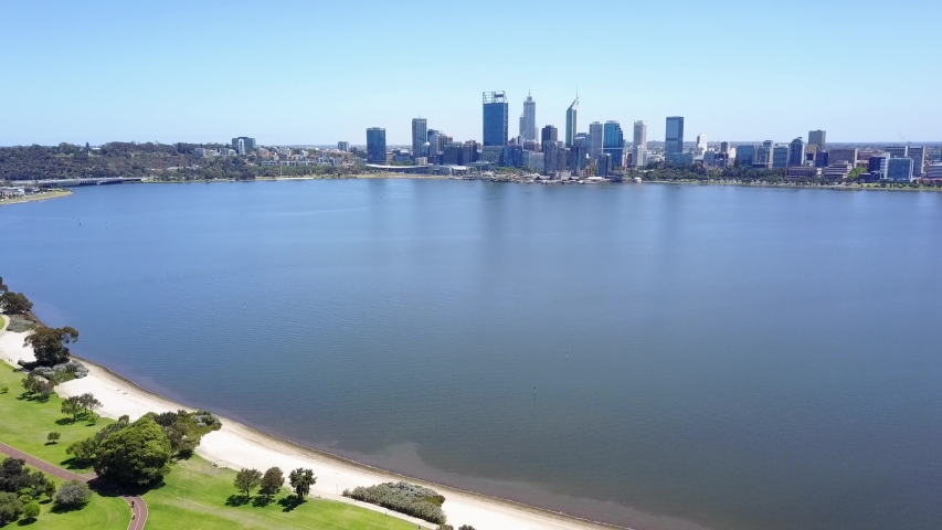 Aerial video footage of the Perth City skyline including the Swan River and Sir James Mitchell Park in South Perth.