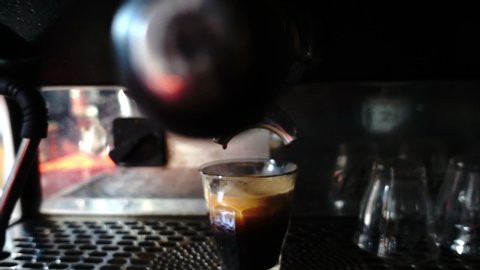 Barista preparing espresso shot, HD slow motion