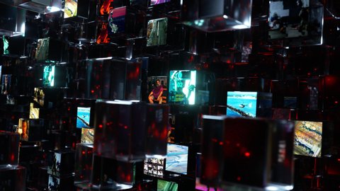 A wall of bright video screens containing personal data in a dark internet made of millions of flying glass blocks passes by. Abstract 4K animation.