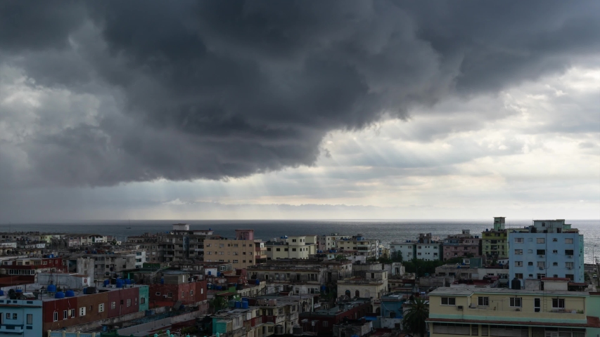 Beautiful Aerial Time Lapse of the Havana City, Capital of Cuba, during a dramatic and storm cloudy day.