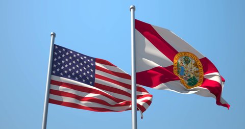 Florida flag and the USA on a flagpole realistic wave on wind not synchronously, solid background. State of Florida in The United States of America. Tallahassee. Jacksonville. Miami.