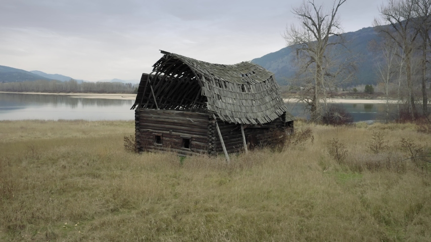 Aerial of old abandoned western barn on a ranch. British Columbia, Canada 