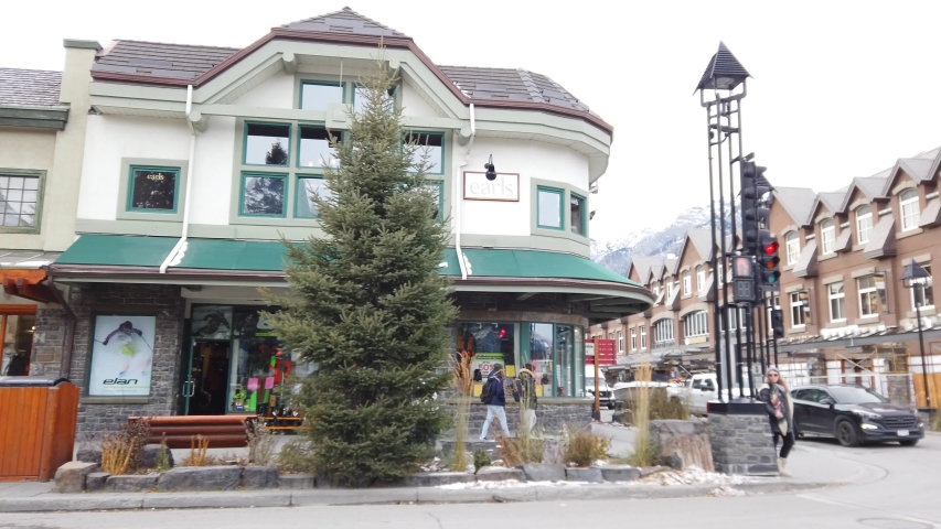 Driving by the shops on Banff Ave in Banff, Alberta