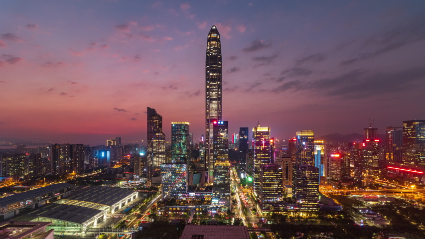 Shenzhen Futian District financial center skyline from dusk to night time lapse Royalty-Free Stock Footage #1041744871