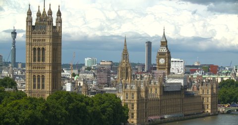 LONDON, ENGLAND, 02 AUGUST 2017: Houses Of Parliament, River Thames And Big Ben In London. Houses of Parliament after its occupants, the Palace lies on the north bank of the River Thames in the City